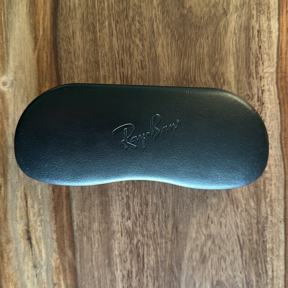 Black Ray-Ban sunglass or eyeglass case. EUC. Hinge closure. Cream lining.